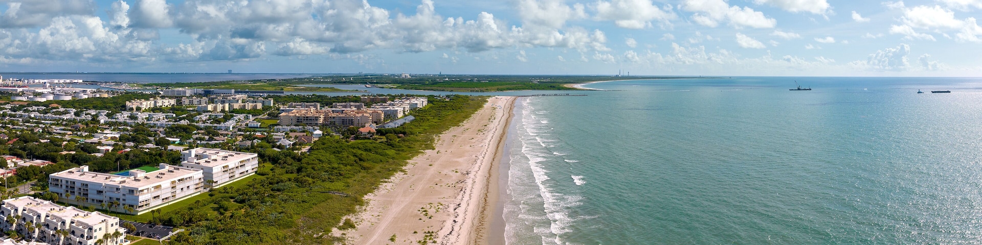 Aerial view of Cocoa Beach - Cape Canaveral and the ocean. June 27, 2022