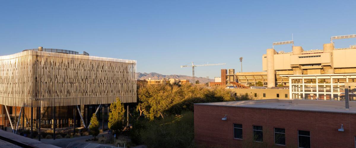 University of Arizona academic building with the football stadium in the distance