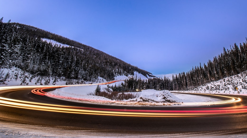 Light trails from cars traveling on Berthoud Pass, Colorado near Winter Park on Highway 40