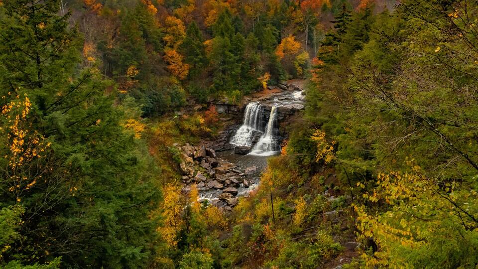 Aerial view of Blackwater Falls with the autumn forest around in State Park in West Virginia