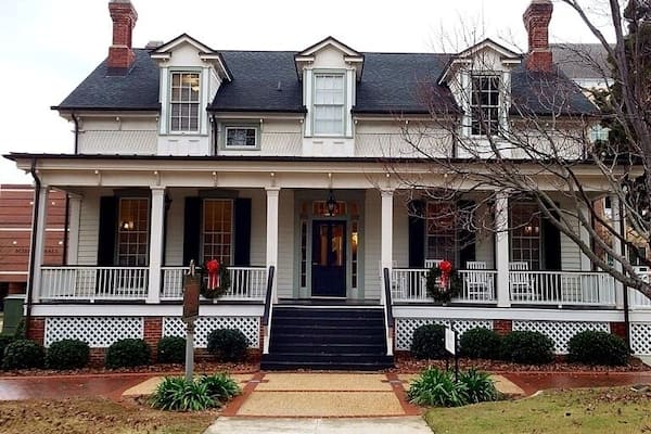 Home of Freeman Walker, outstanding citizen of early Georgia. Born in Virginia in 1780, he came to Richmond County in his youth and studied law. Freeman Walker, in 1826, deeded 70 acres of land to the United States Government to be used as an arsenal-the site now of the Junior College of Augusta. He reserved one acre as a family burial ground, known as the Walker Cemetery. He was the father of Maj. Gen. W. H. T. Walker, CSA. Admitted to the bar in 1802, he followed a life of public service; City Attorney for three years and Mayor of Augusta 1817-19, being the first to hold the city´s chief executive office under the name of Mayor, and Brigade Inspector of Gen. Valentine Walker´s brigade in 1813. He represented Richmond County in both branches of the State Legislature and represented Georgia in the U. S. Senate. His speech on the Missouri Compromise attracted nation-wide attention.
He died in 1827 and is buried in the Walker Cemetery.