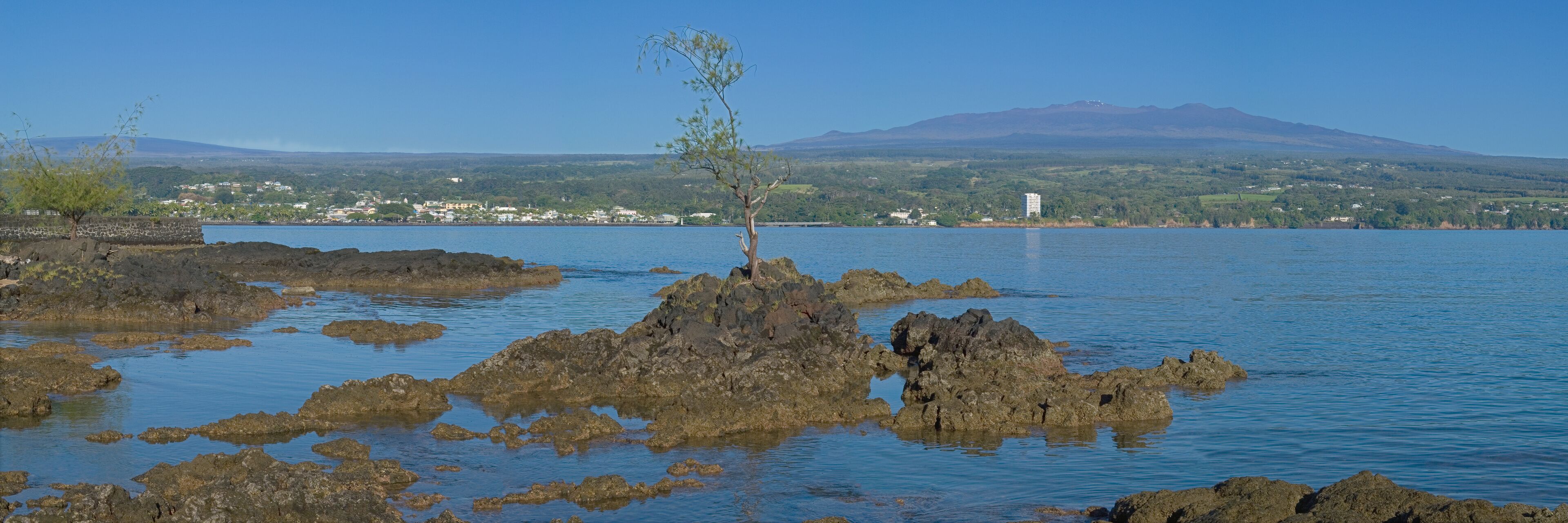 View of Mauna Kea and Mauna Loa from Queen Liliuokalani Gardens, Hilo, Big Island, Hawaii