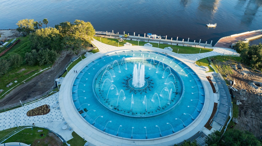 Aerial view of Friendship Fountain in Jacksonville, Florida, highlighting its circular design, water jets, and surrounding park area in Duval County.