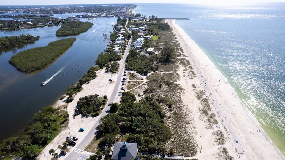 Aerial Drone Nokomis Beach. Gulf of Mexico on Casey Key in Nokomis Florida, United States. Red tide water.