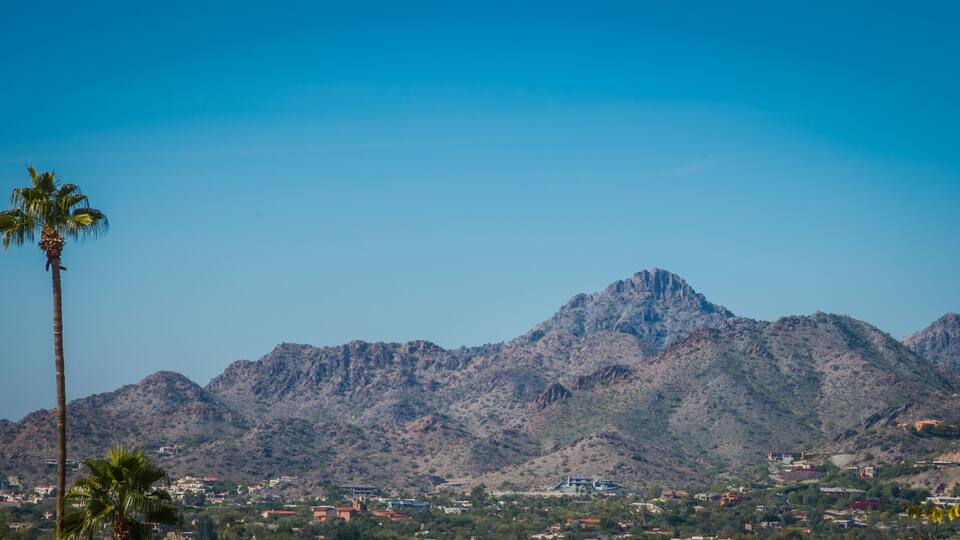 Neighborhoods at the base of tall mountains are rapidly growing in the Phoenix, Arizona area where population is steadily growing. Housing in these mountain base developments are usually more expensiv