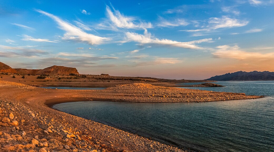 Beautiful panoramic landscape of the Lake Mead National Recreation Area from its muddy shore at sunset in summer, Nevada.