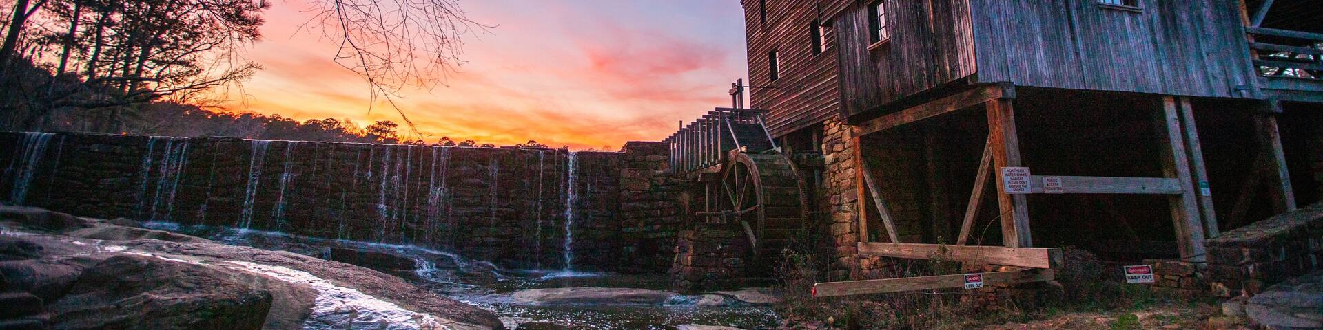 Sunset over the historic Yates Mill in Raleigh, North Carolina.