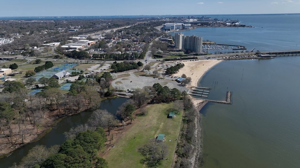 Newport News, VA coastline living by James river landscape with city streets public parks resort hotels and neighborhoods on warm sunny day in Virginia