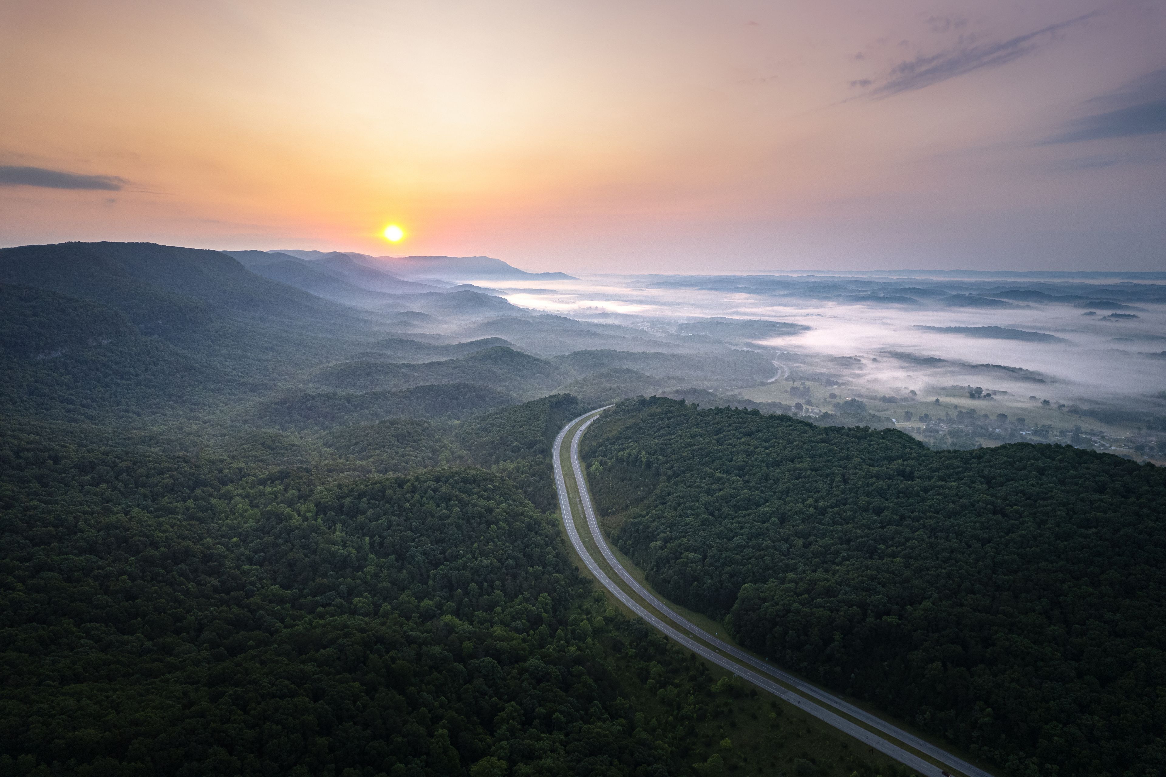 Road, highway empty on the center. Tennessee mountains 