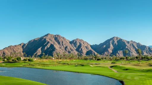 Golf course panorama in Palm Springs, Coachella Valley mountains web banner, California