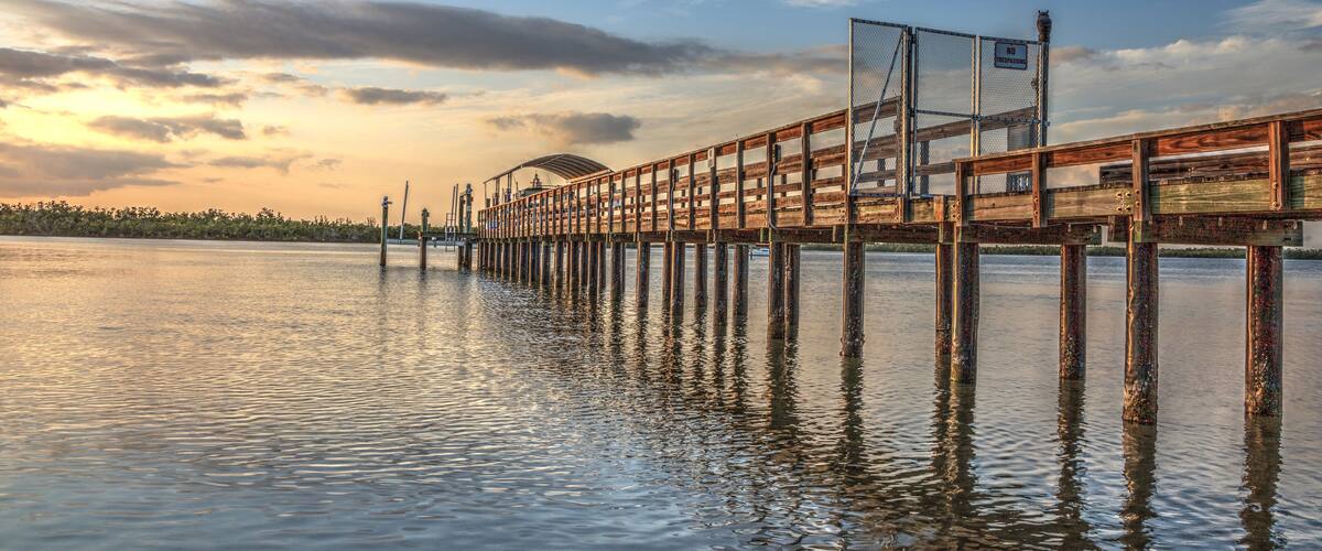 Isle of Capri Fire Department dock for Boat 90 at sunset near Marco Island, Florida