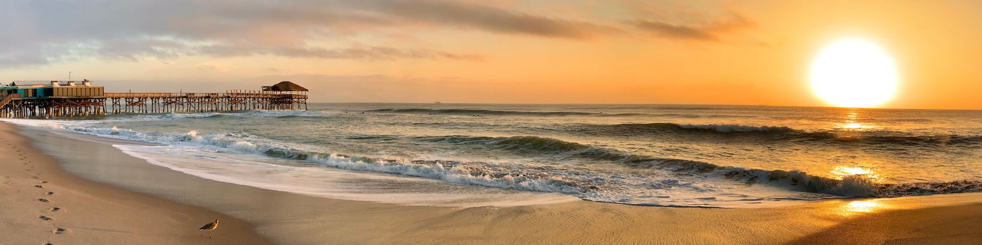 Sunrise at Cocoa Beach pier near Cape Canaveral on Florida's Space Coast
