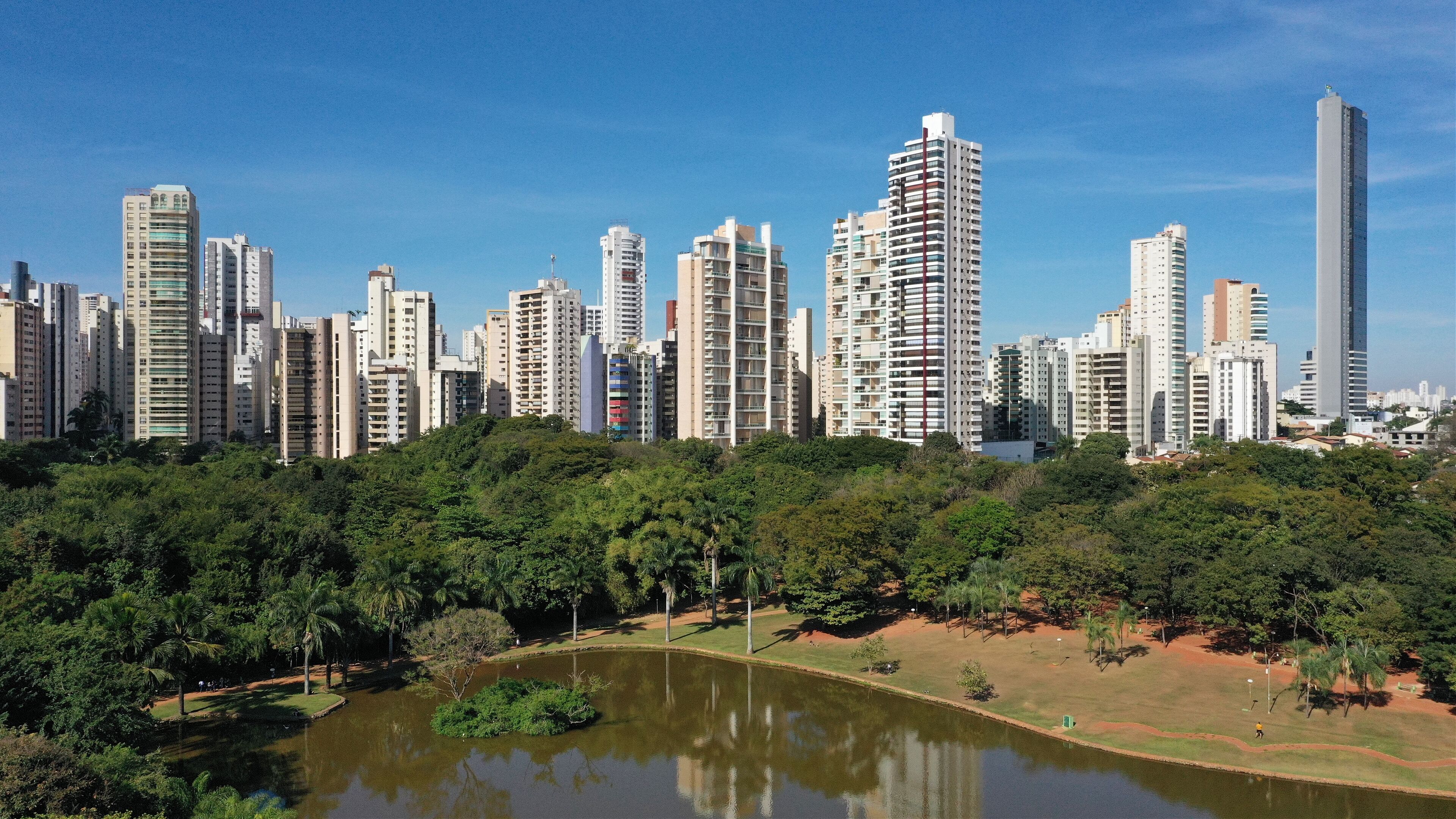 Panoramic view of modern buidings surrounding a beautiful park with a lake in the heart of Goiania, Goias, Brazil 