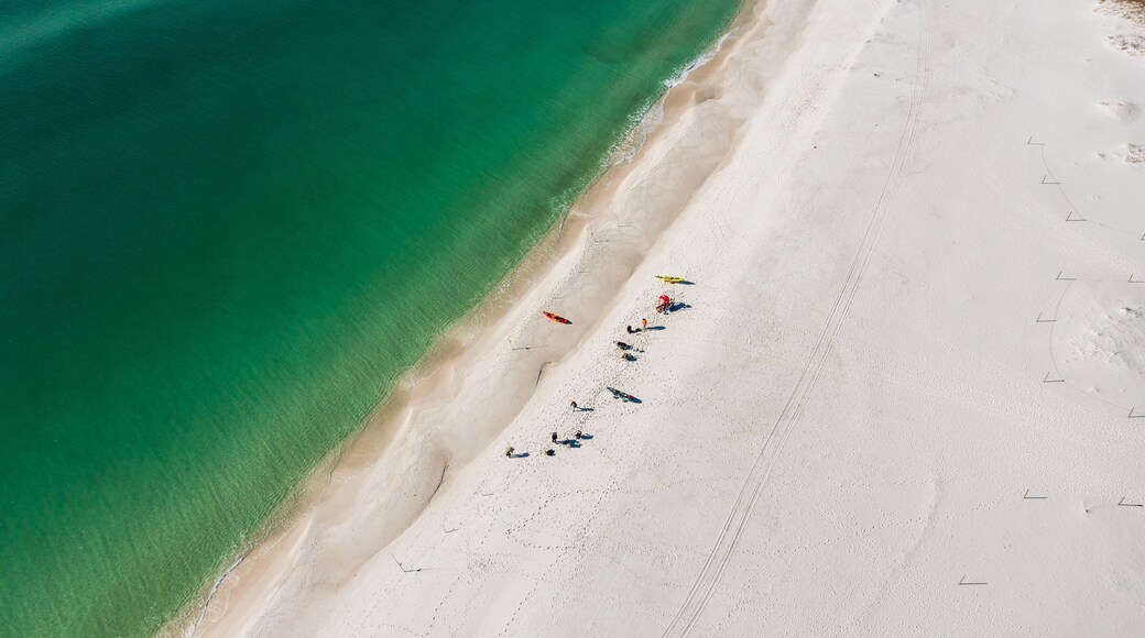 Pensacola Beach is a Florida resort community on the Gulf Coast barrier island of Santa Rosa.