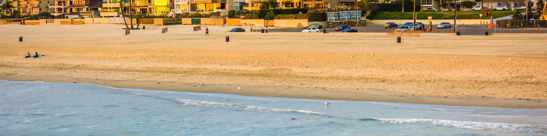 Waves in the Pacific Ocean and view of the beach at sunset in Seal Beach, California.; Shutterstock ID 256851745