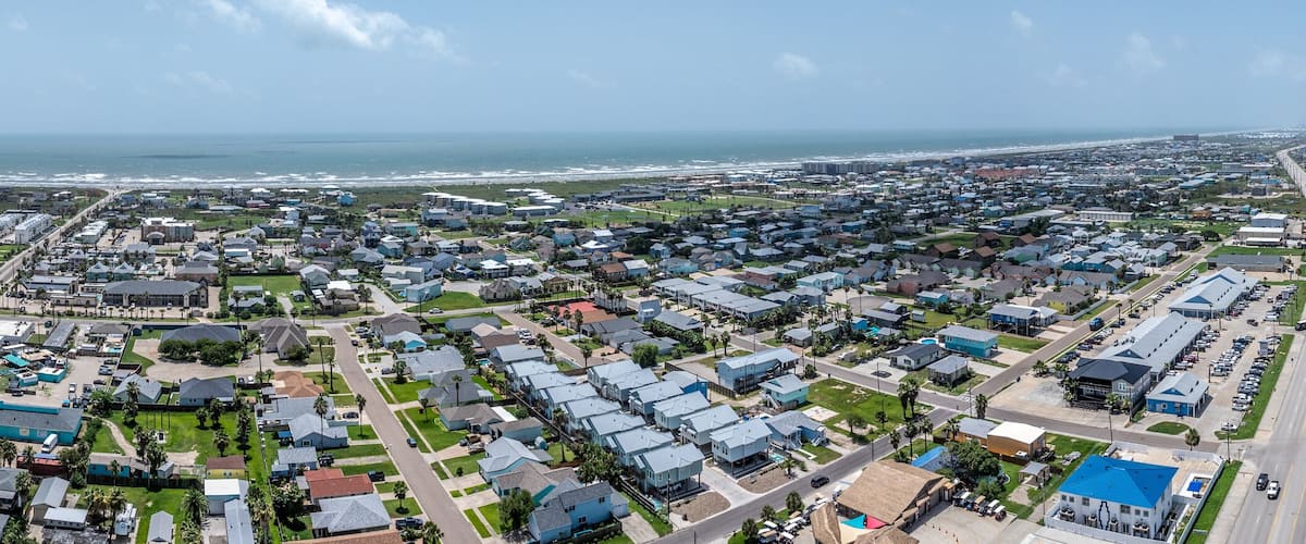panoramic aerial landscape view of Port Aransas located on Mustang Island at Gulf of Mexico during a sunny day
