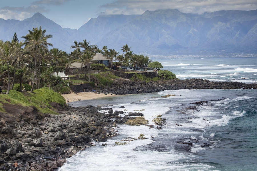 Waves breaking on the rocks on a sunny day during a spectacular ocean view Paia, Maui, Hawaii, USA; Shutterstock ID 261801152