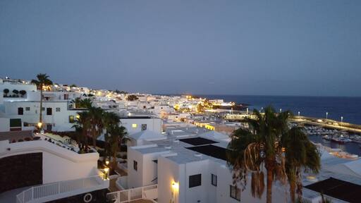 Puerto del Carmen is a resort town on the southeast coast of the Spanish island of Lanzarote. It’s home to beaches such as sandy Playa Grande and Matagorda, which is known for its steady breeze. Fishing boats cluster at the old town dock, El Varadero. Avenida de las Playas, a beachside boulevard, is lined with shops,restaurants and lively nightclubs. Just inland, Rancho Texas Lanzarote Park has a zoo. Wikipedia