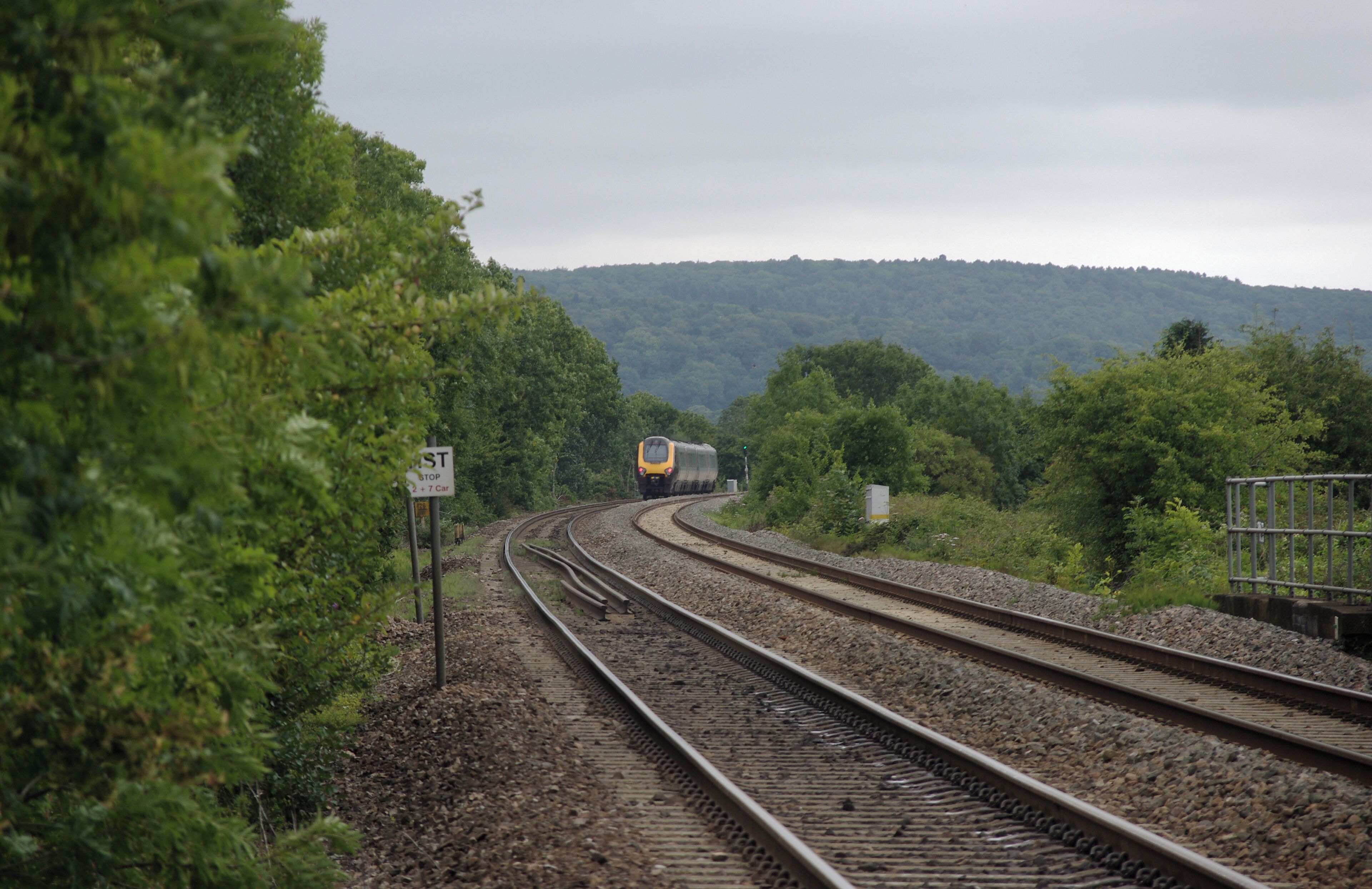 A CrossCountry Class 220 DEMU passes north through Nailsea & Backwell railway station.