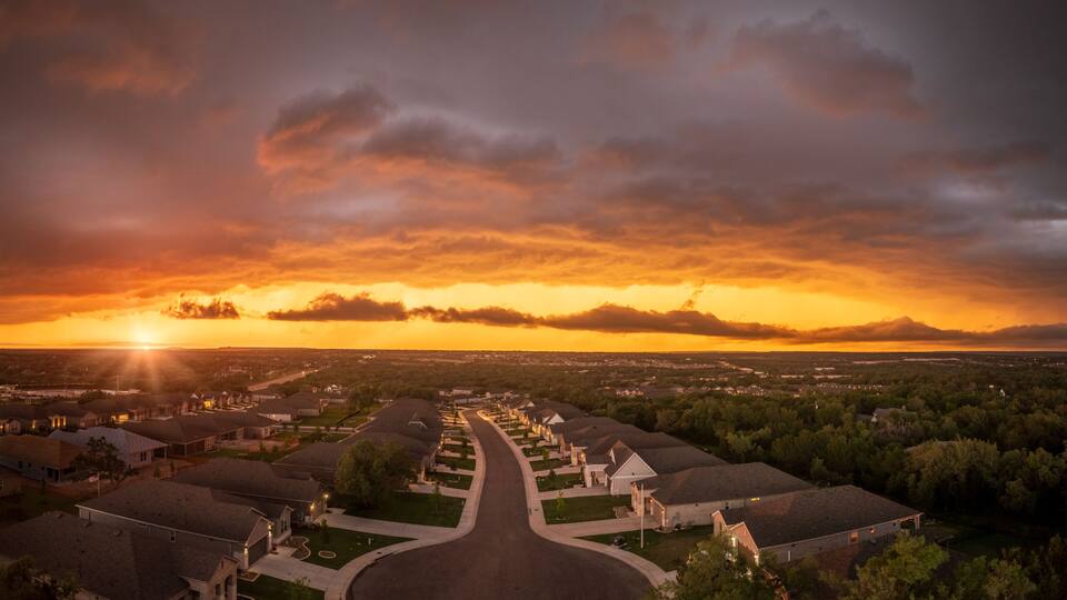 Aerial view of a dramatic sunset lighting clouds before severe thunderstorm near Georgetown Texas