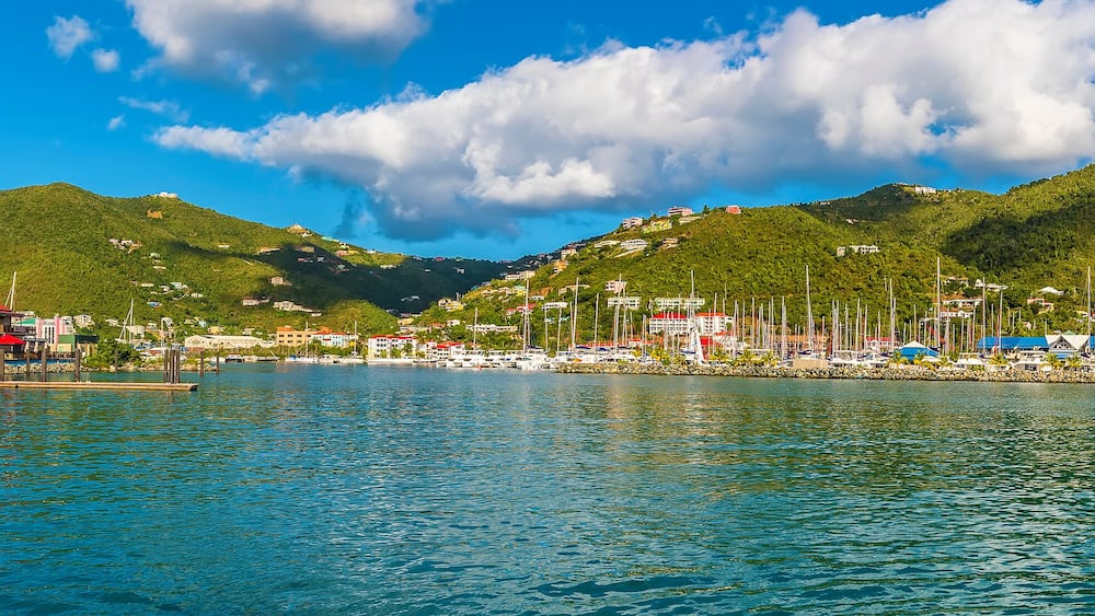 A view past the cruise ship pier towards the port of Road Town on Tortola