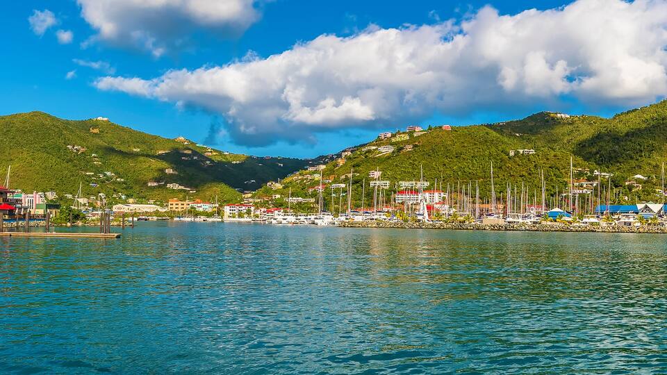 A view past the cruise ship pier towards the port of Road Town on Tortola