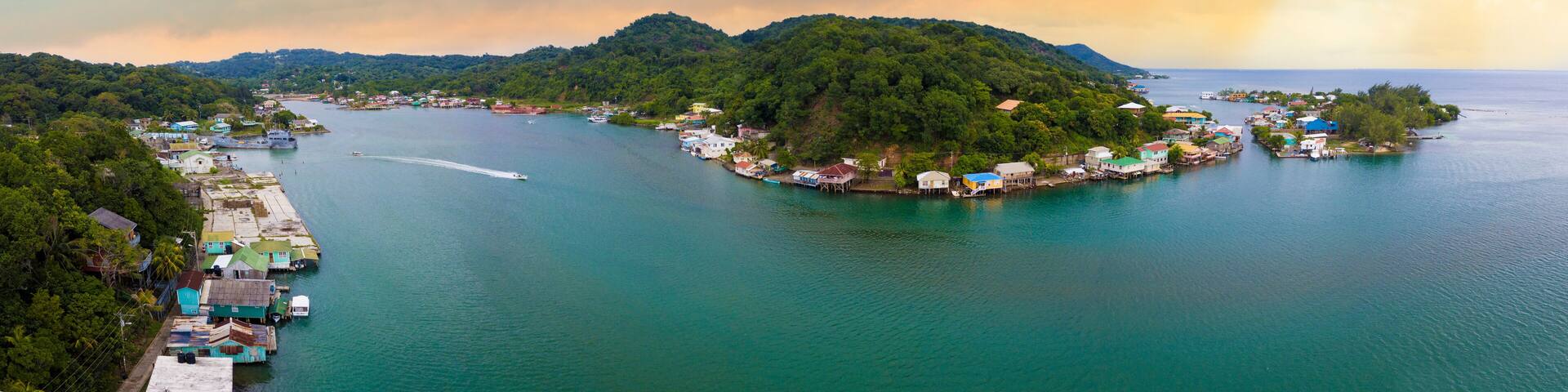 180 degree aerial panorama of Roatan at sunrise.