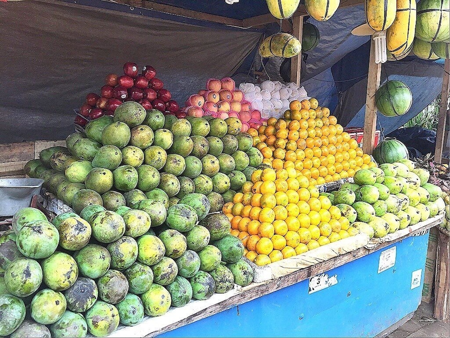 You'll see these Street Fruits stands everywhere in Bandung especially if they're in season. Love how they stack it up so nice & neat. 🍎🍏🍊🍍🍈 #market