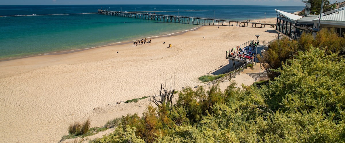 Port Noarlunga Beach which includes general coastal views and a sandy beach