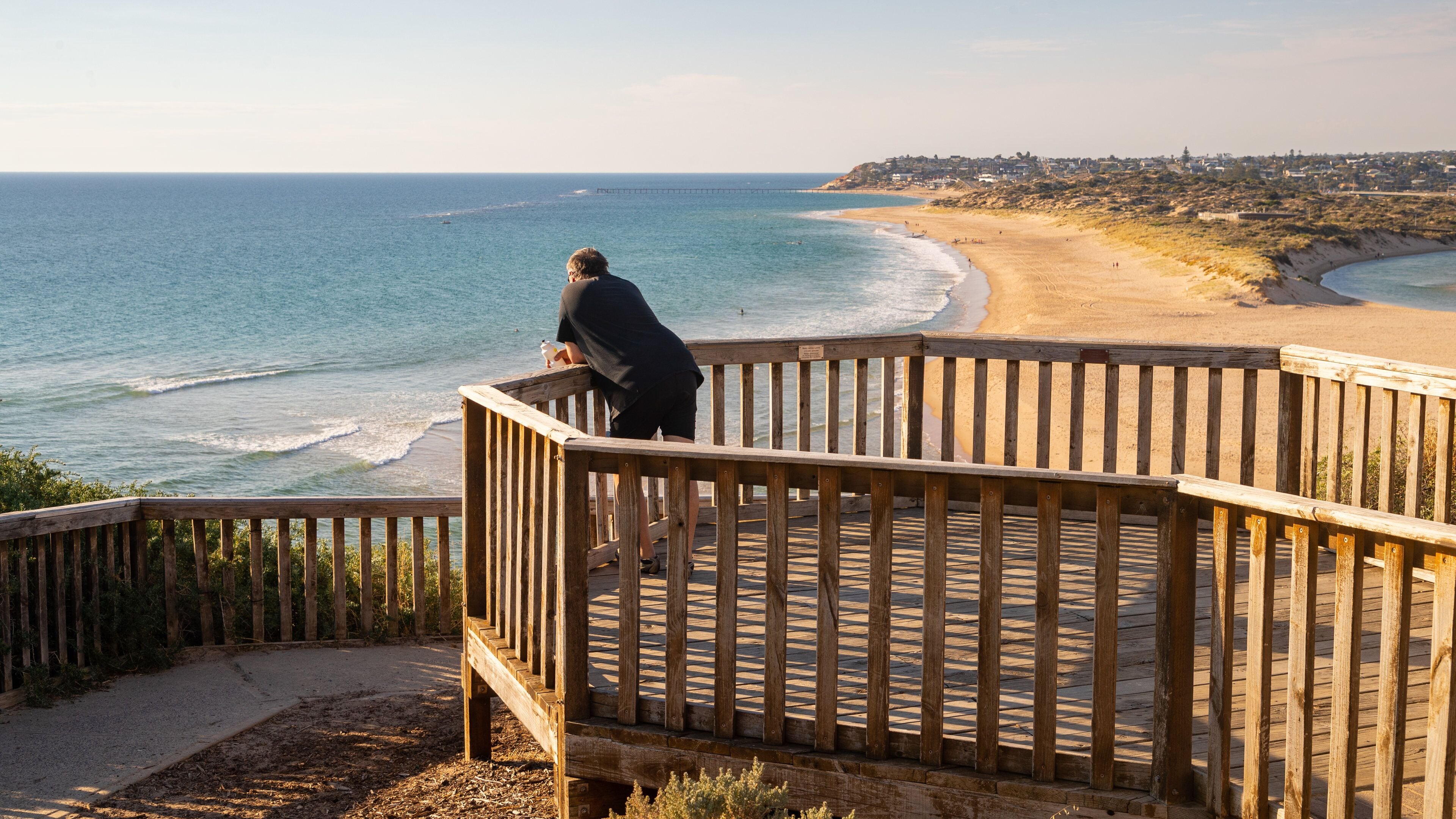 South Port Beach featuring a sunset, general coastal views and views