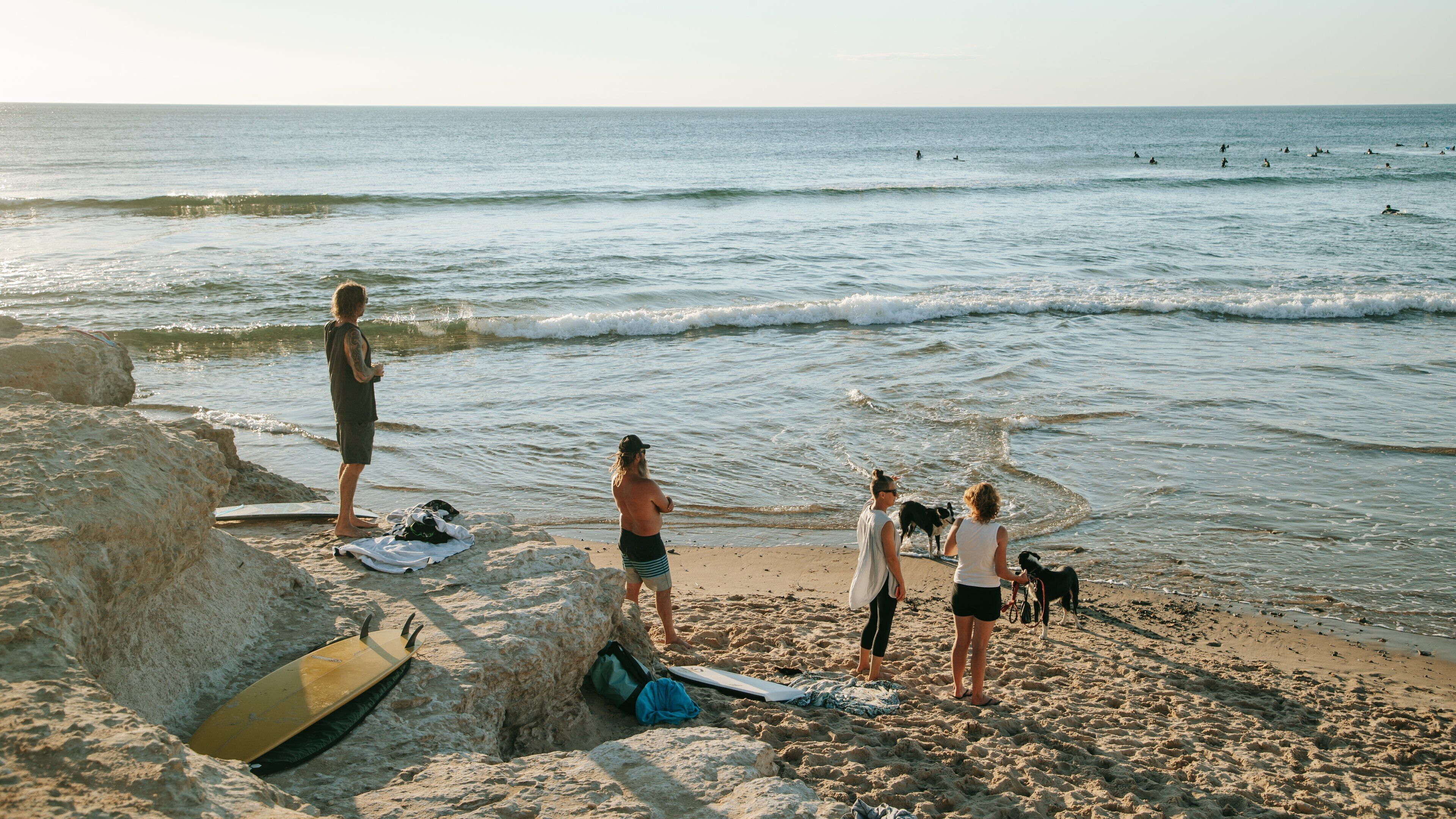 South Port Beach featuring general coastal views, a sunset and a sandy beach