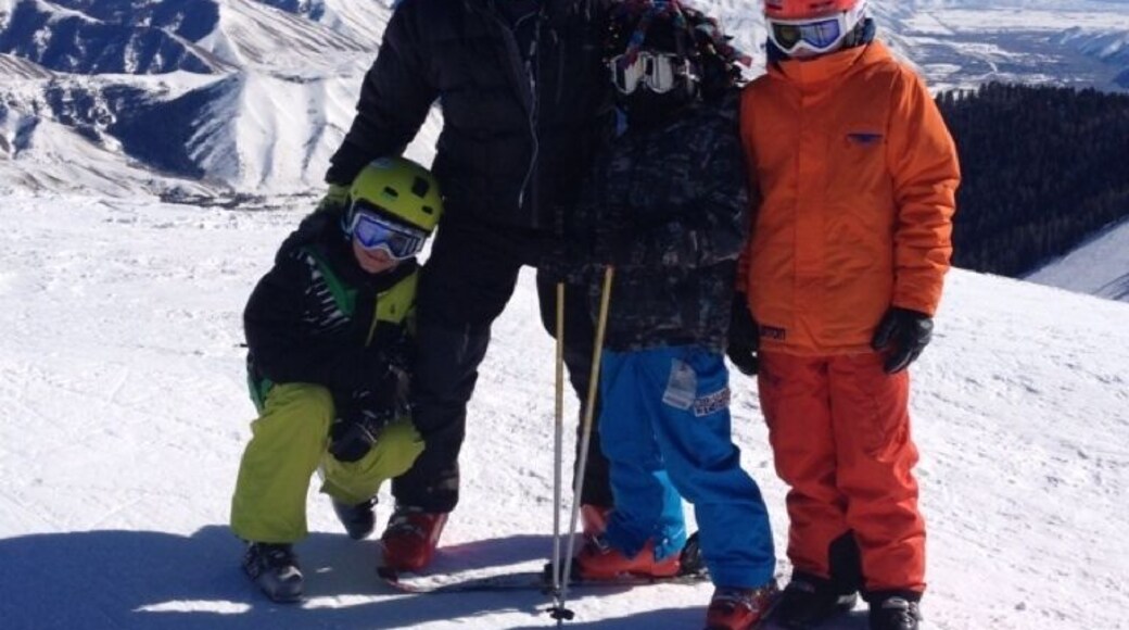 My crew and me atop Bald Mtn, Sun Valley, ID with Seattle Ridge in the background. Incredibly fun, challenging and family oriented skiing. Après ski is a blast, and Ketchum a great town with lots to do.