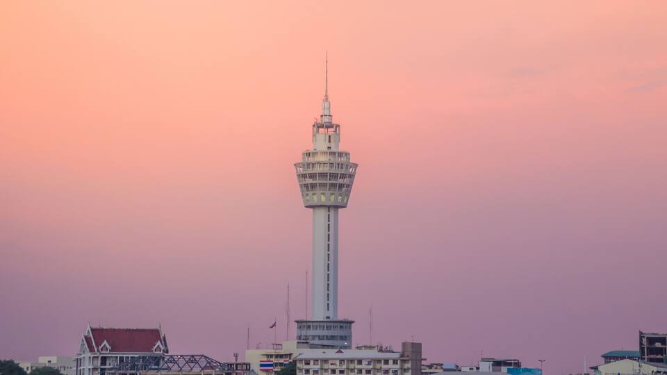 Riverfront view of Samut Prakan city hall with new observation tower and boat pier. Samut Prakan is at the mouth of the Chao Phraya River on Gulf of Thailand.