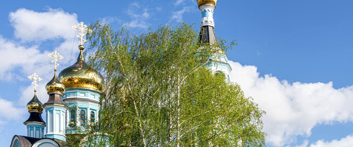 Domes of the Cathedral of St. Tatiana in Cheboksary against the blue sky