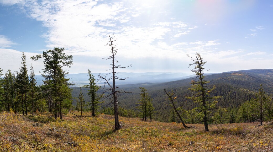 Beautiful view from the Sudovaya mountain to Inzer rocks, Yamantau mountain, Iremel mountain. Russia, South Ural, Bashkortostan Republic, Beloretsky district, near the Tirlyansky village.