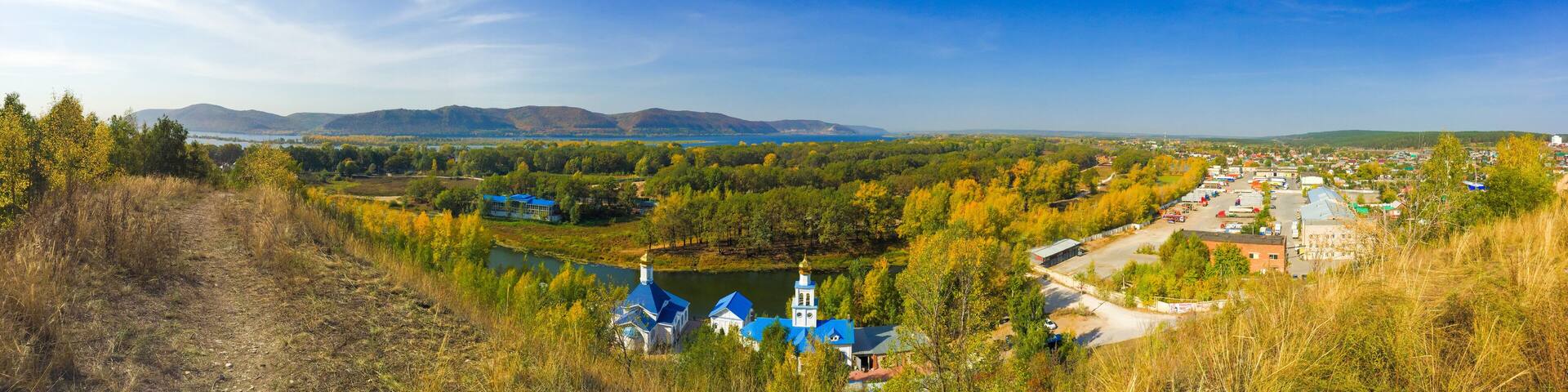 Tsarev Kurgan, Samara region, Russia. Panoramic view on the church of the icon of the Mother of God Inexhaustible Chalice and Zhiguli mountains