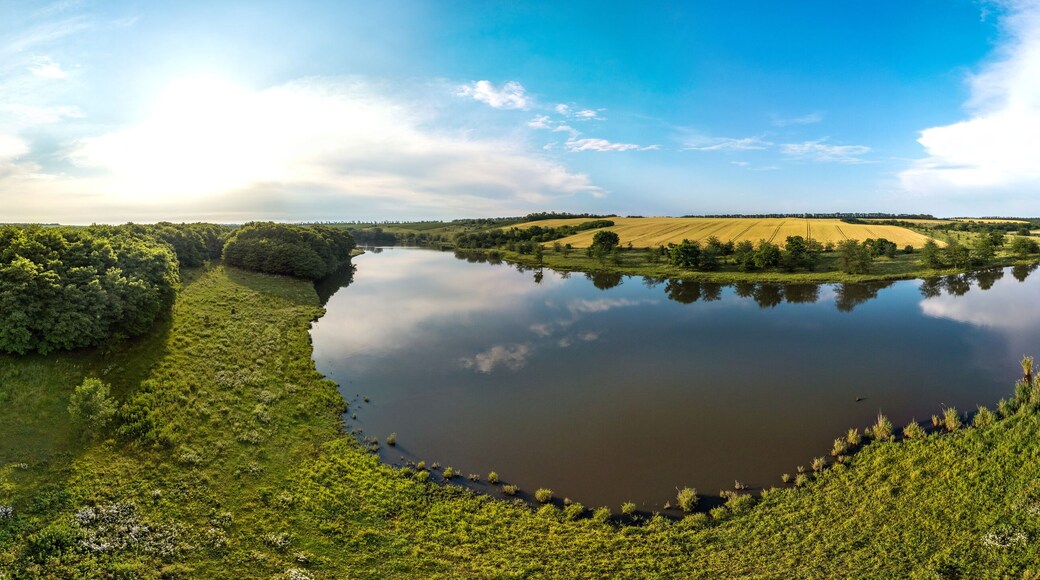 Sredny Khutor farm near the small Zelenchuk second river in the Krasnodar Territory, South of Russia. Aerial little panorama on a summer day