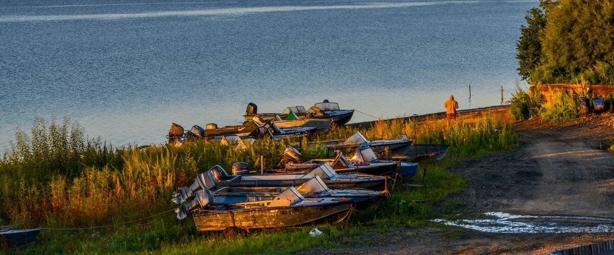 boats at Amur river harbor in Verkhnii Nergen (Nanaysky district, Khabarovsk krai, Russia)