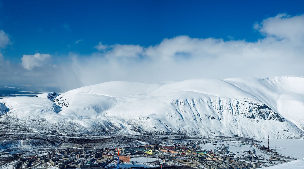 The Khibiny mountains. Panorama of the Northern slope of the mountains of Aikuaivenchorr. View of the city Kirovsk