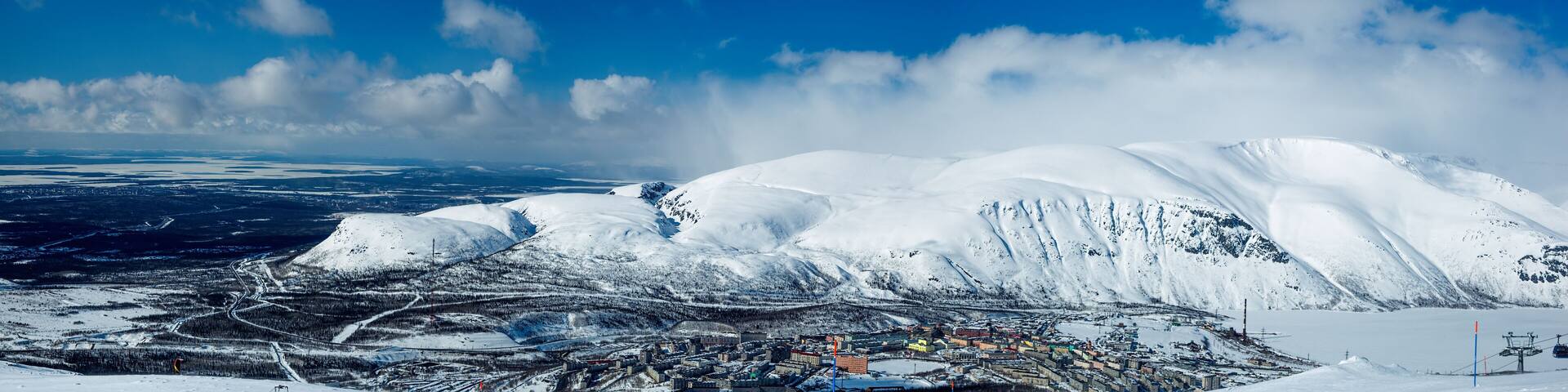 The Khibiny mountains. Panorama of the Northern slope of the mountains of Aikuaivenchorr. View of the city Kirovsk