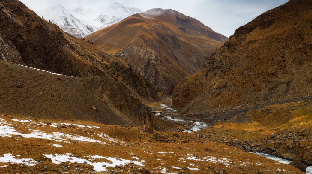Beautiful panoramic view of the gorge. Autumn mountain landscape. Oysor river in Dagestan, Russia. Valley in Chirkhalyu or Chvakhilo waterfalls. Majestic mountain peaks.