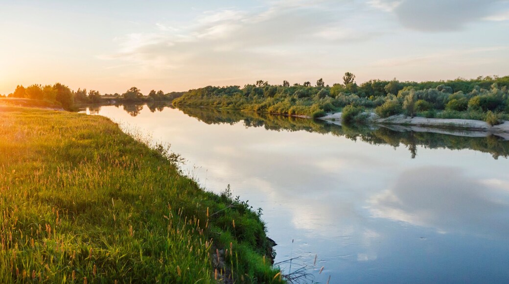 Beautiful evening natural landscape near the river during sunset. Ryazan region village Lasitsy