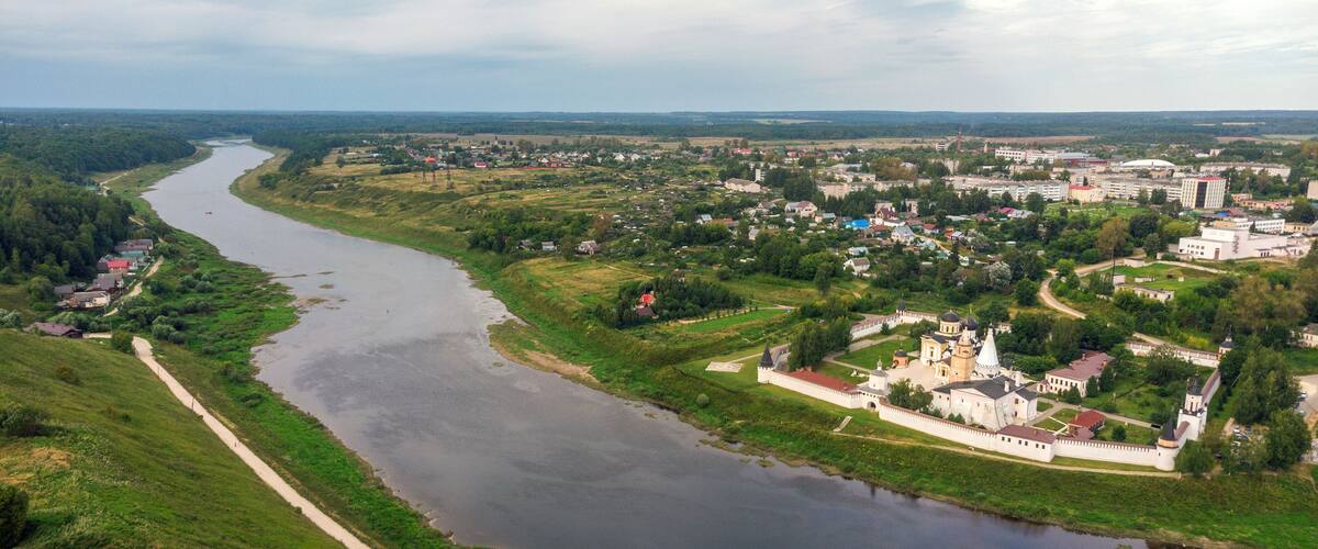 Picturesque view of small ancient town Staritsa with Staritskiy Holy Dormition Monastery on the Volga River in Russia.