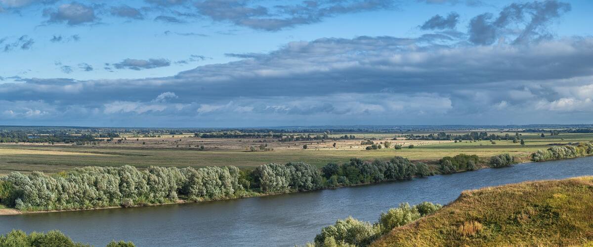 Panorama of the Russian Oka river before sunset on a clear autumn day.
