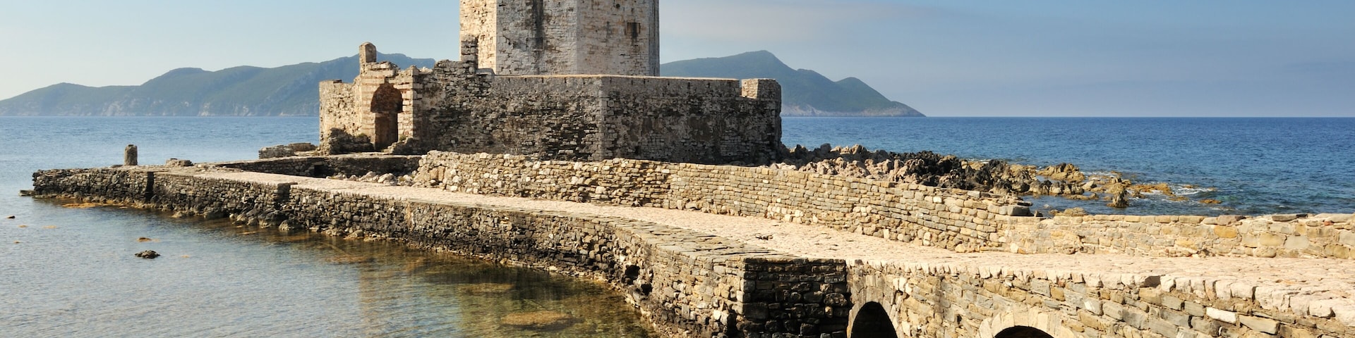 Picture of the watchthower from the medieval castle at Methoni, southern Greece, as it extends into the sea.