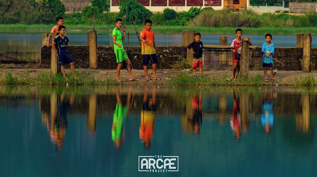 A group of boys fishing on a small pond in Xam Neua, where we explored some of the cave buildings that were used as shelter during the indiscriminated bombing of Laos--part of a secret fight by the USA during the Vietnam War.