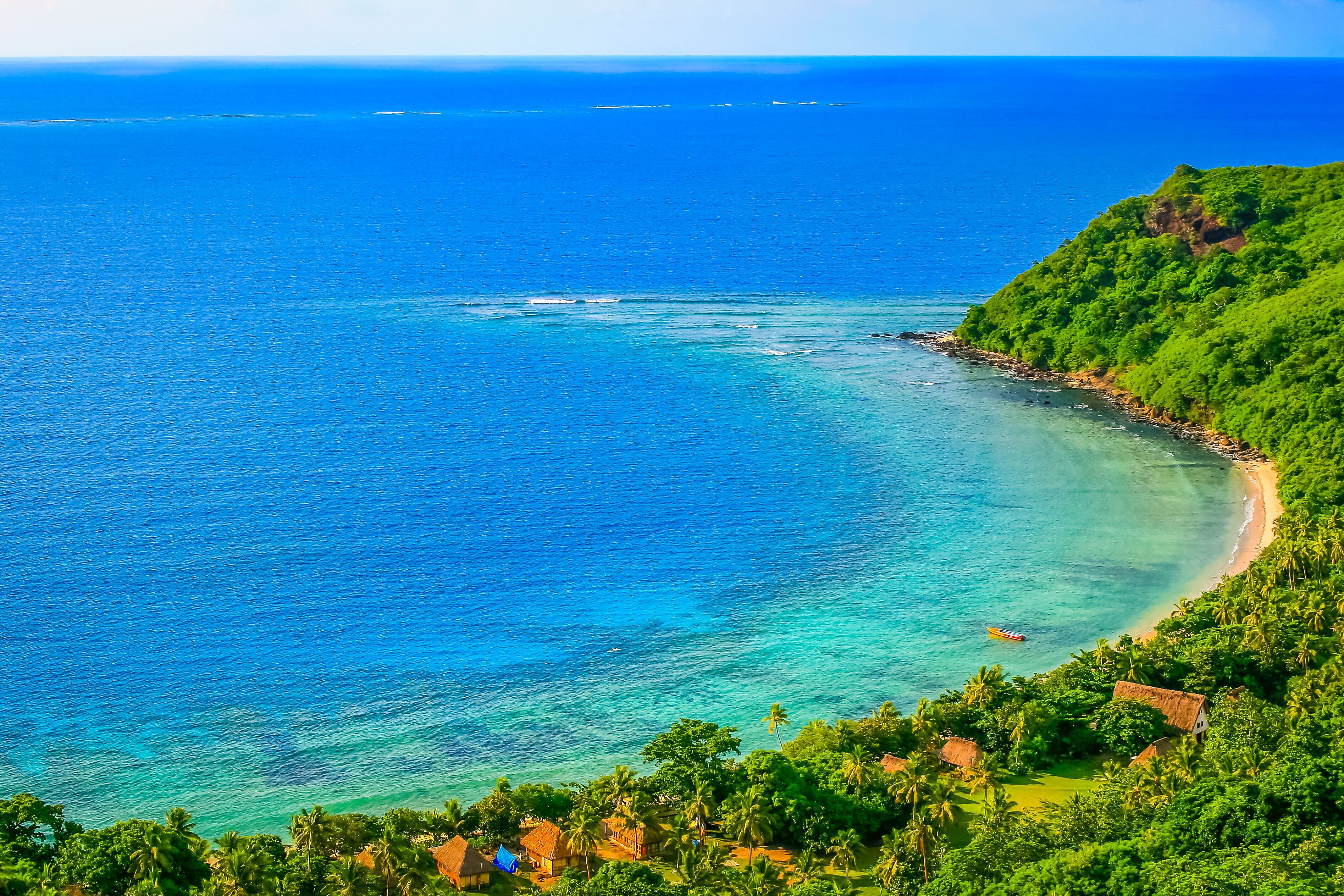 Tropical sandy beach at summer day in Fiji Islands, Pacific ocean
