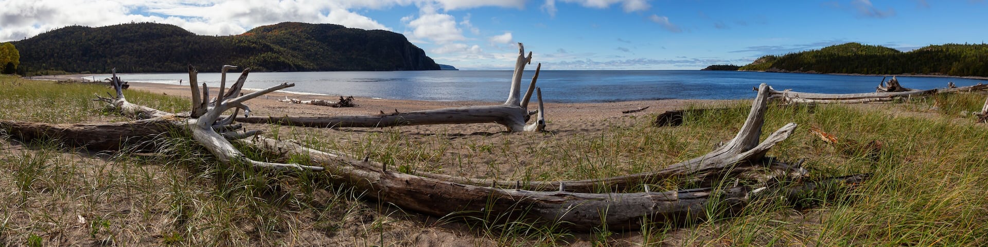 Beautiful view of a sandy beach during a sunny day. Taken in Old Woman Bay, Lake Superior Provincial Park, Ontario, Canada.