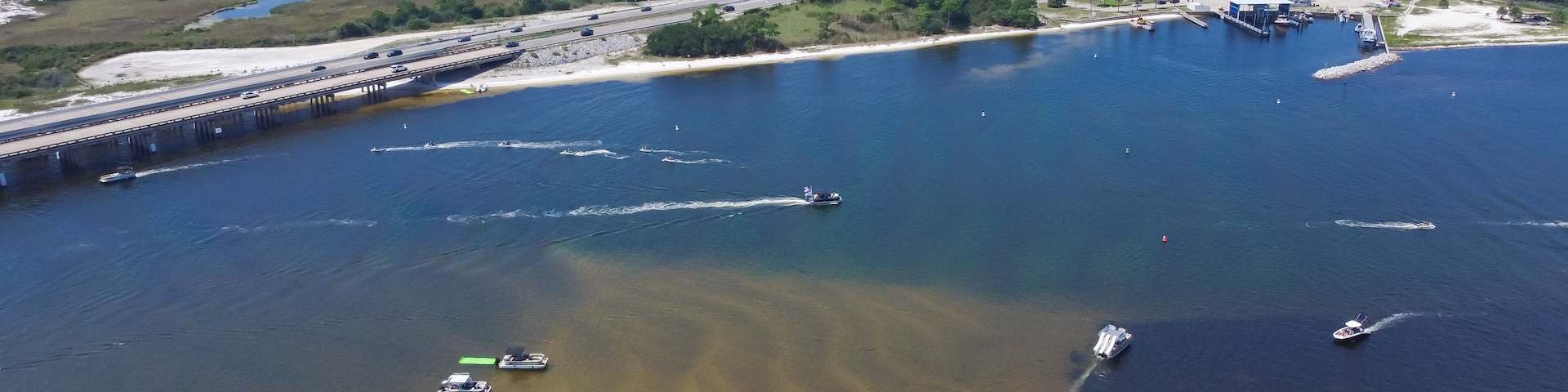 Boats, kayaking, swimming activities on Crab Island near Santa Rosa Island white sandy beach along Gulf of Mexico near Okaloosa Island Grass Flats Swimming basin, Destin, Florida, USA