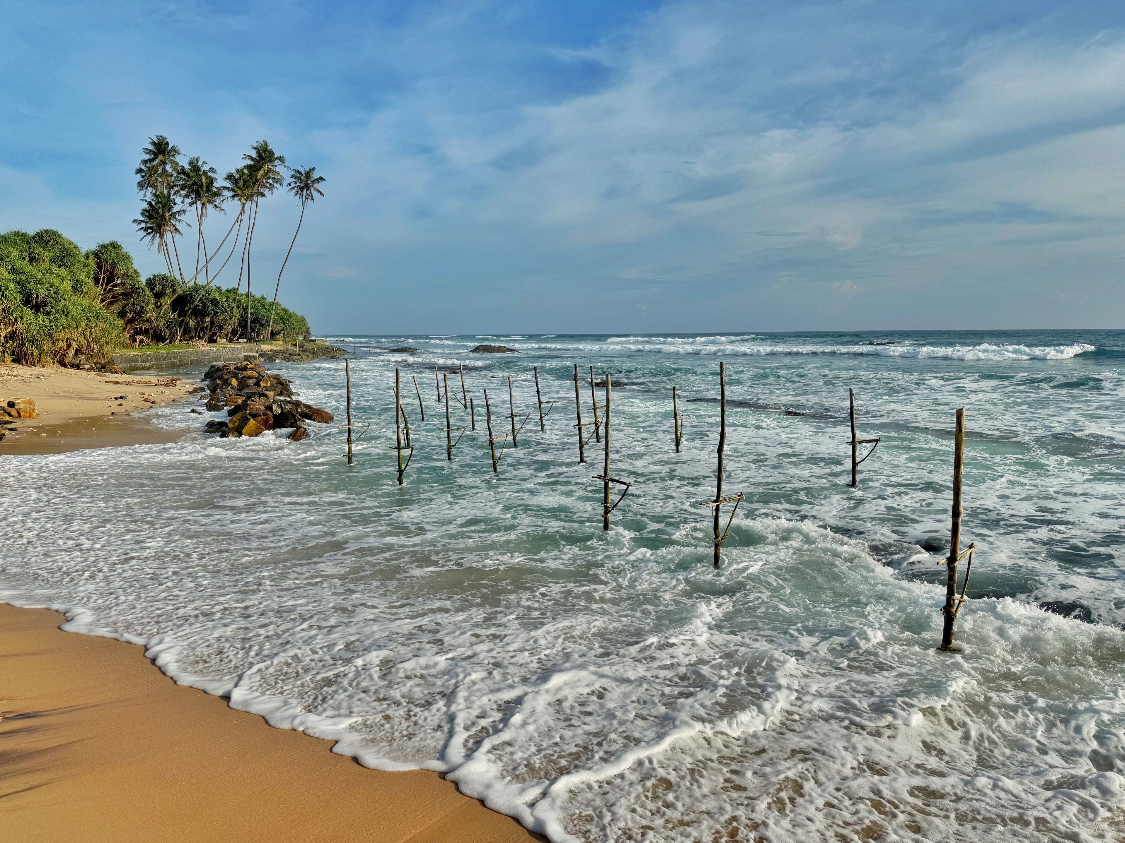 Traditional fishing stilts on Koggala beach, Galle, Southern Province, Sri Lanka